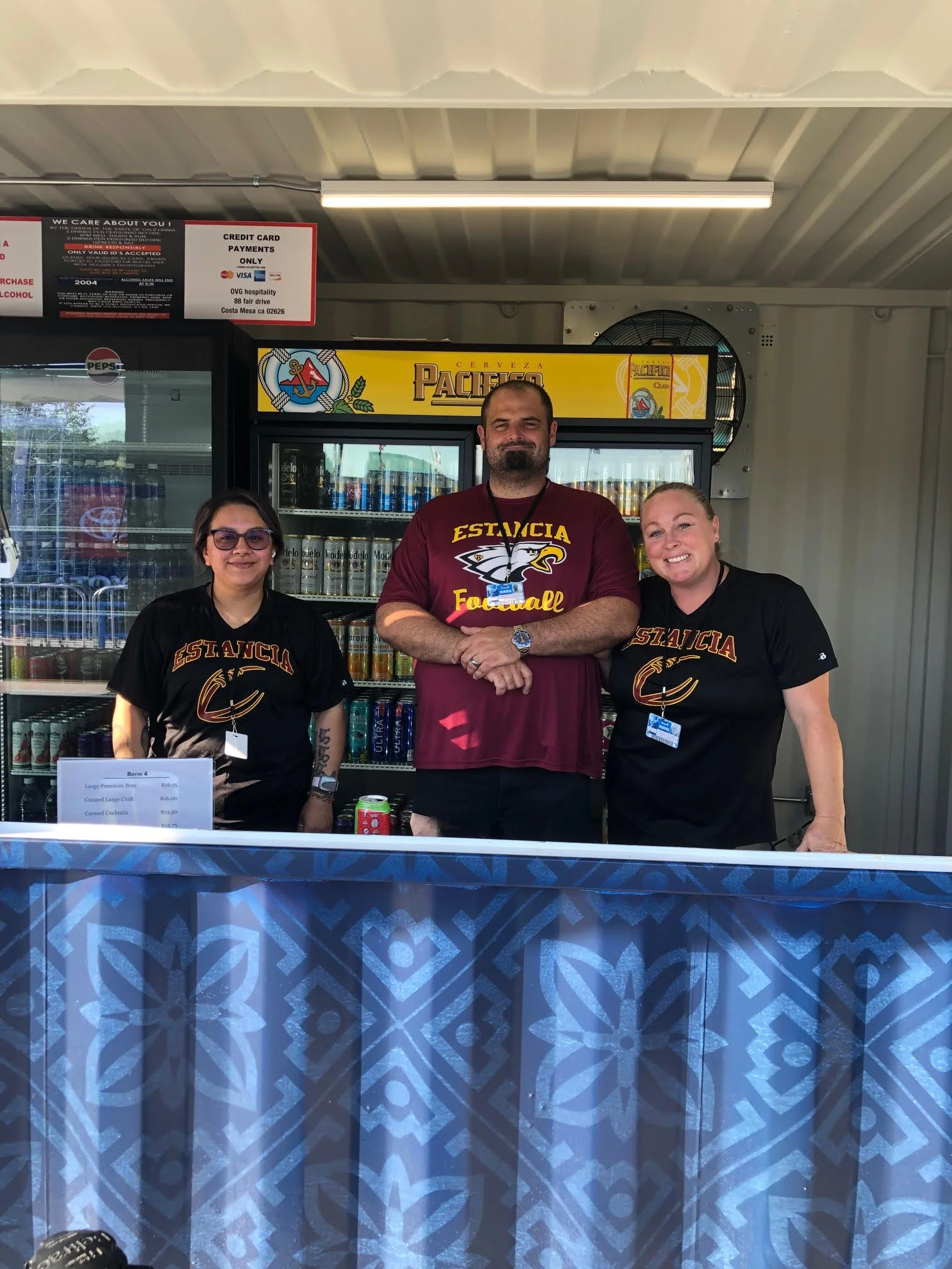 Smiles working the booth